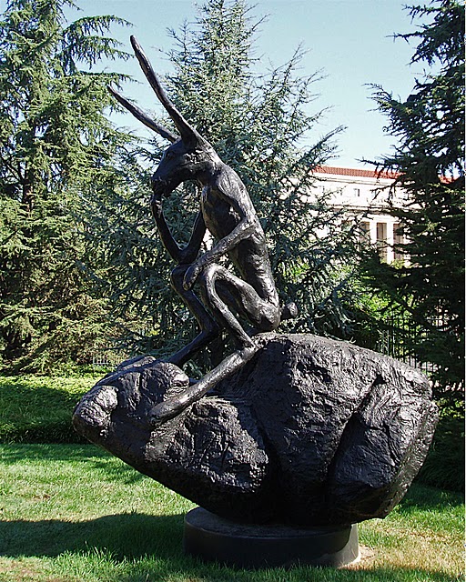 Thinker on a Rock